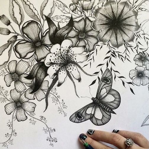 Gorgeous black-and-white flowers and a butterfly tattoo design