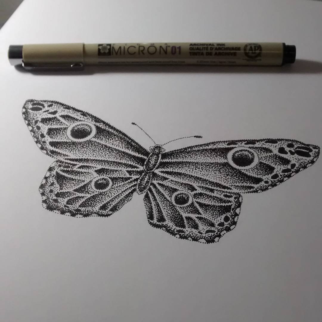 Gorgeous uncolored dotwork butterfly tattoo design