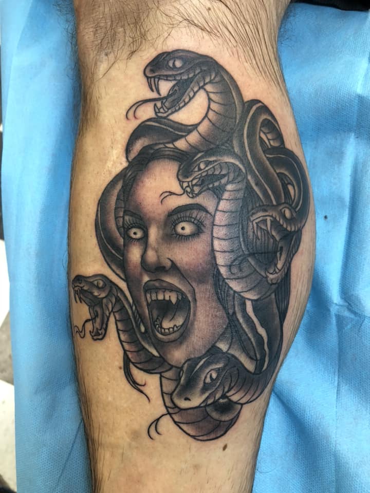 Gorgon medusa tattoo on leg