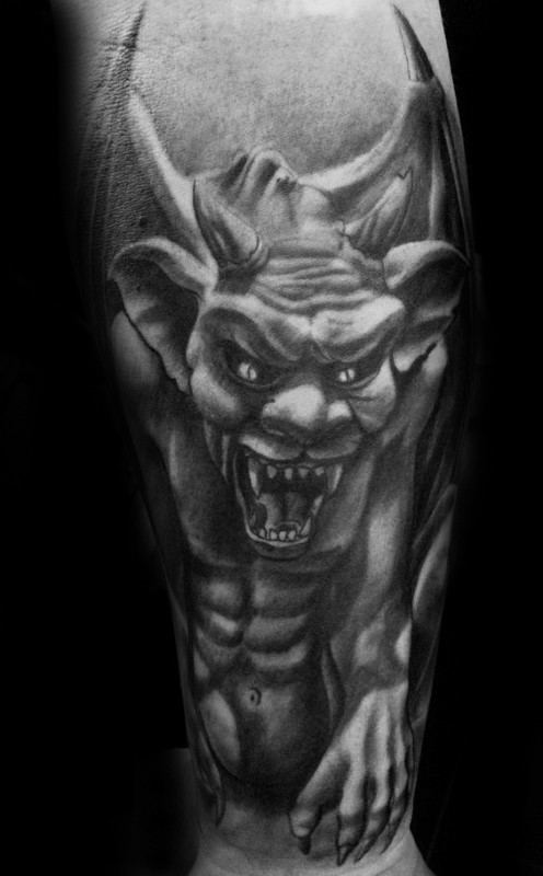 Gray washed style detailed evil gargoyle tattoo