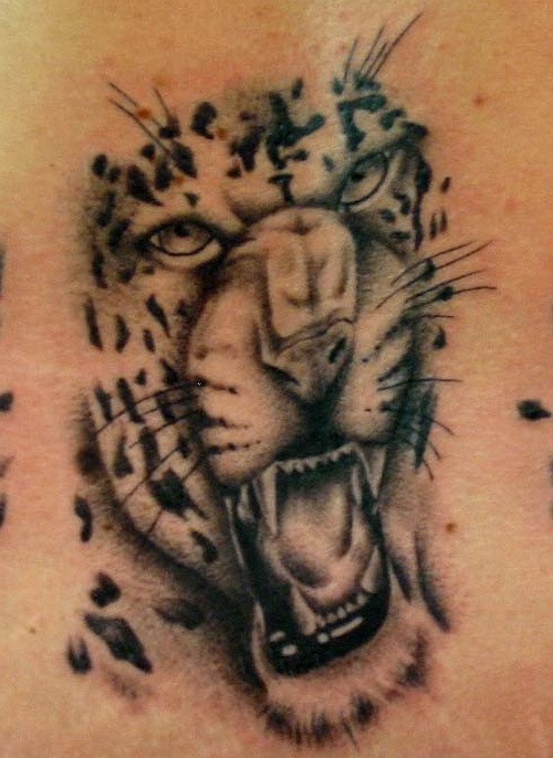 Tatuaje de rostro de guepardo peligroso