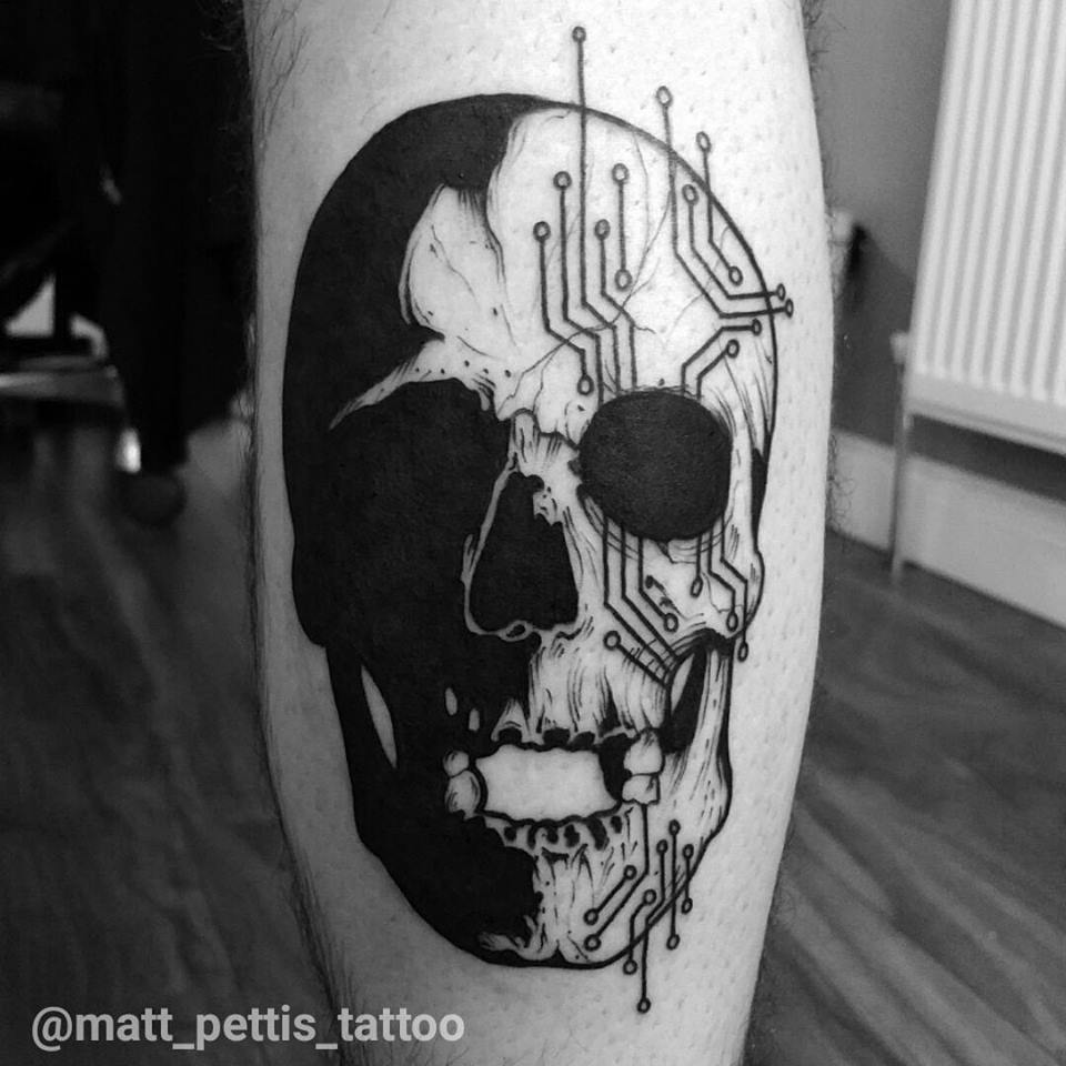 Great black and white skull tattoo on leg