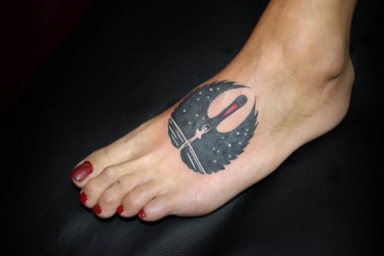 Great black swan with white ballerina tattoo on foot