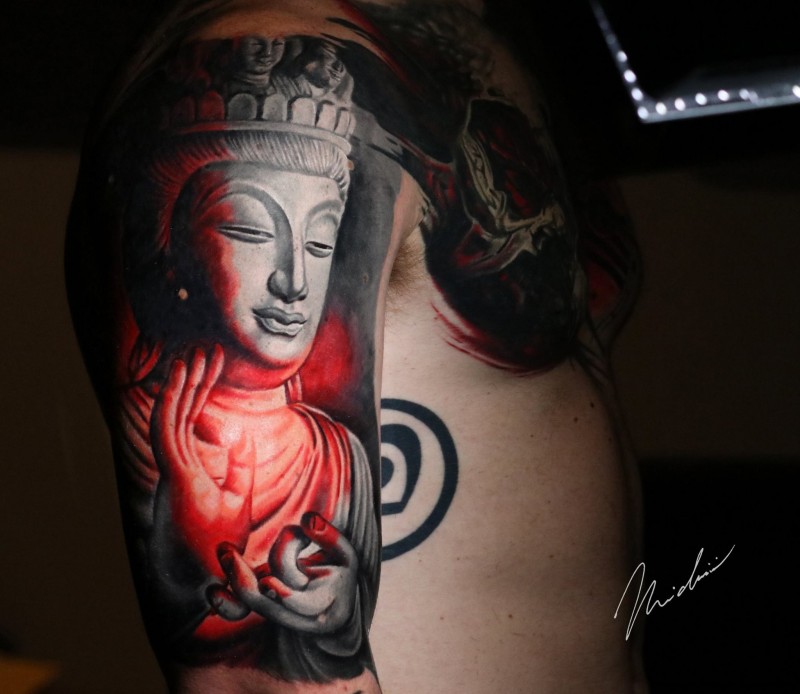 Great buddha tattoo on shoulder