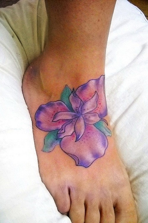 Great colorful iris flower tattoo on foot
