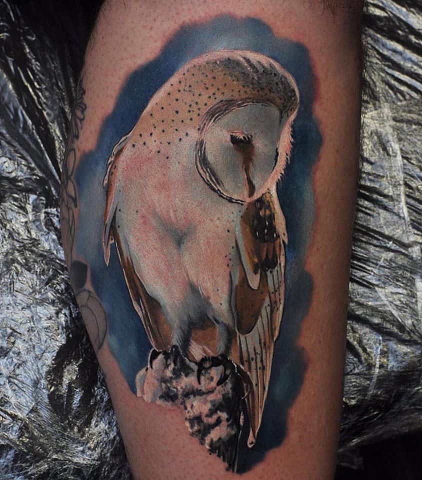 Great colorful owl tattoo