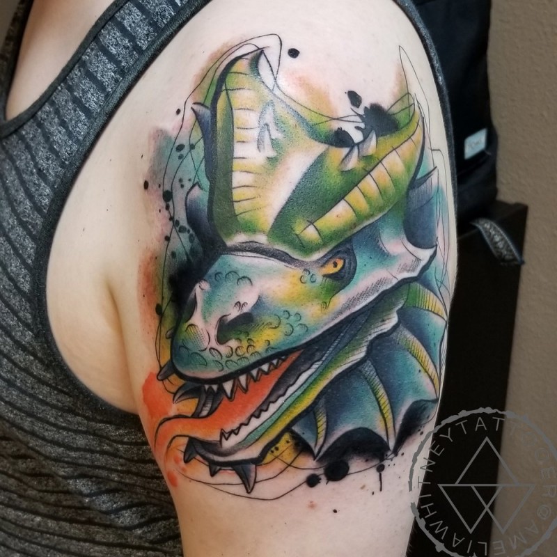 Great dinosaur tattoo on shoulder