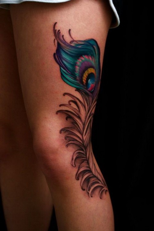 Great lush colorful peacock feather tattoo on hip