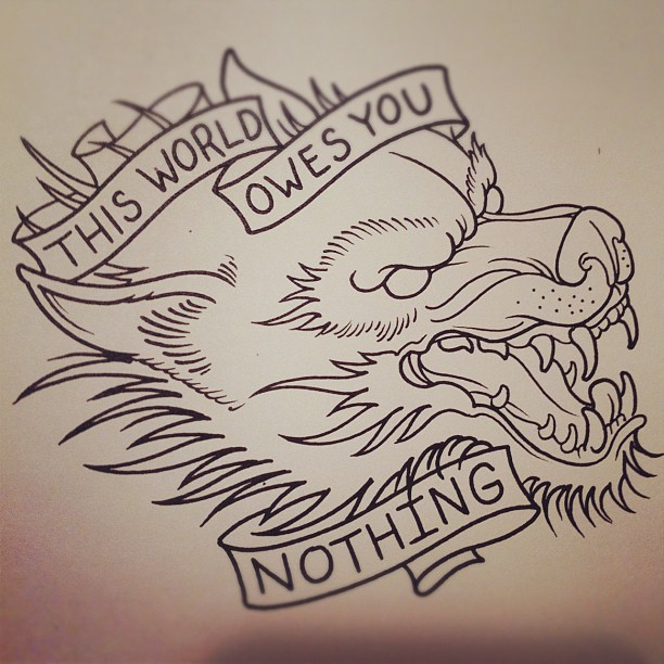 Great new school wolf head with a quoted ribbon tattoo design