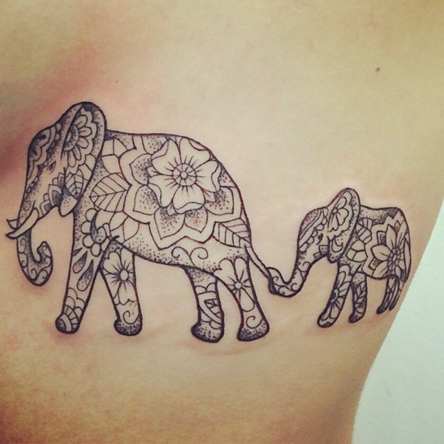 Great ornamented elephant family tattoo for girls on rib-side