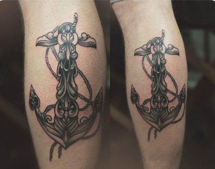 Great pair ornamental anchors tattoo on shins