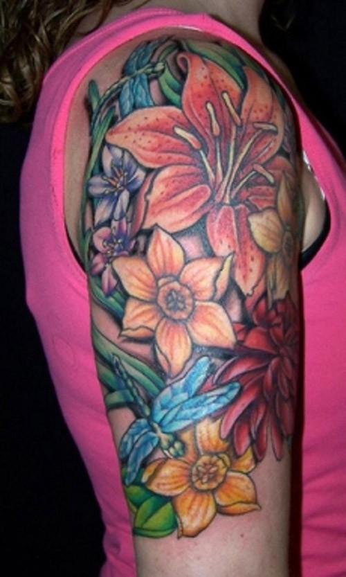 Great vivid-colored tropical flowers tattoo for women on upper arm