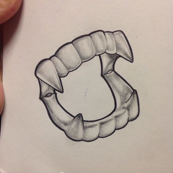 Grey-ink pencilwork vampire teeth tattoo design