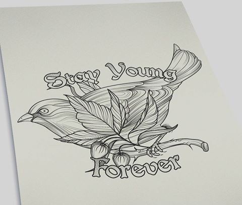 Grey-ink sparrow sitting on berried branch with lettering tattoo design