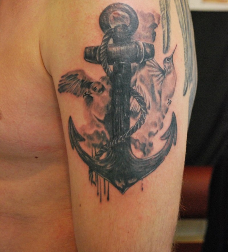 Harsh black anchor with birds tattoo for guys on shoulder