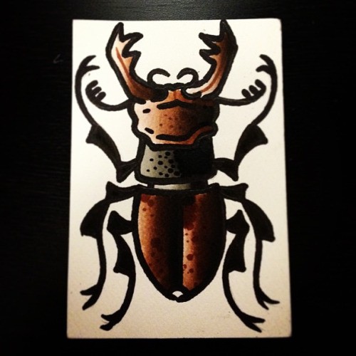 Harsh dark brown old school bug tattoo design