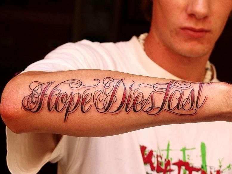 Hope dies last quote tattoo on arm