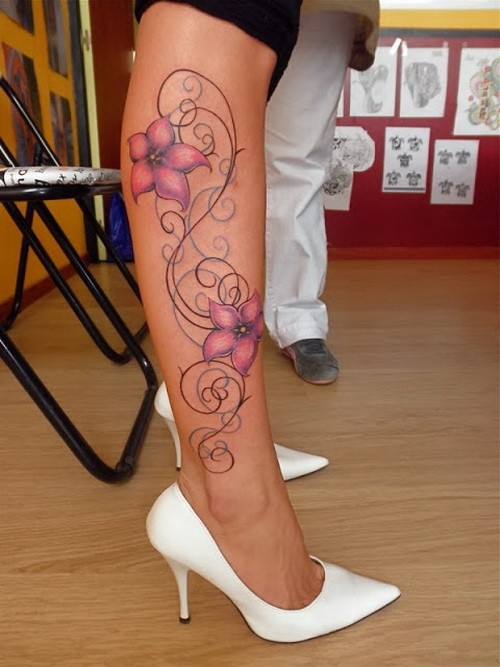 Hot pink jasmine flower tattoo on shin