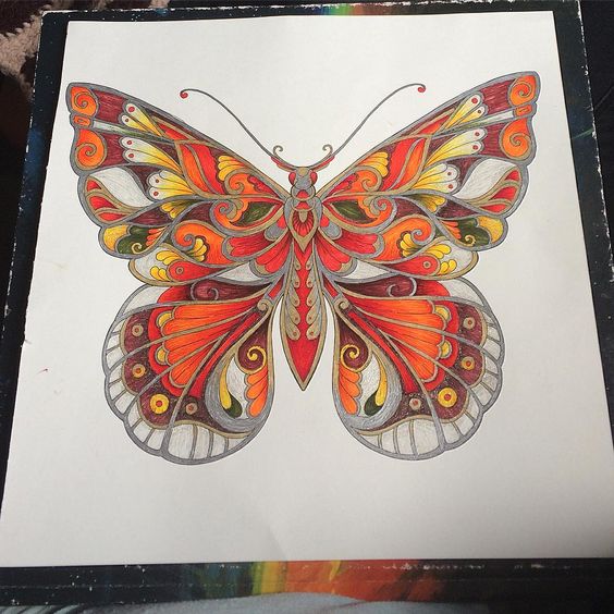 Impressive huge butterfly in orange colors tattoo design