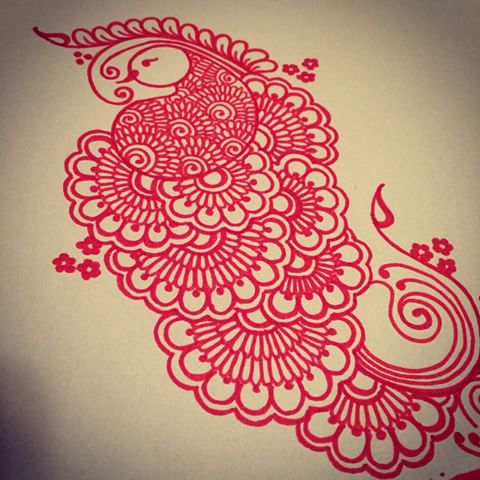 Impressive red-ink peacock for henna tattoo design