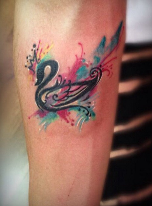 Impressive vivid-colored swan tattoo on arm