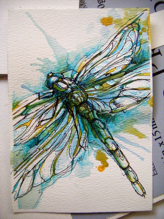 Impressive watercolor dragonfly tattoo design