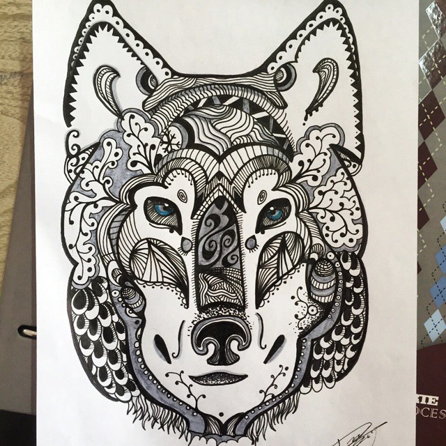 Impressive wolf muzzle with different patterns tattoo design
