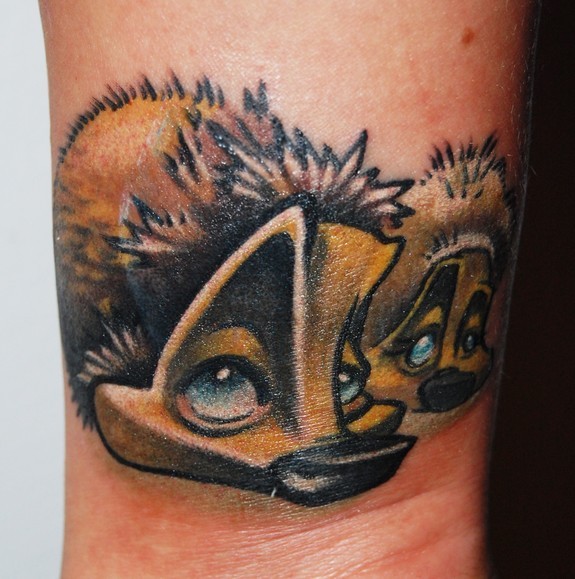Interesting-designed colorful hedgehog tattoo on leg