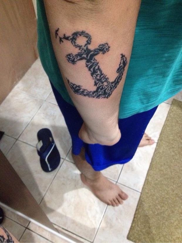 Interesting anchor consisting of birds tattoo for guys on firearm