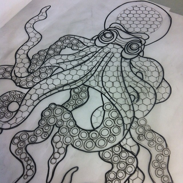 Interesting grey geometric-patterned octopus tattoo design