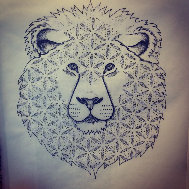 Interesting lion head with flower of life pattern tattoo design