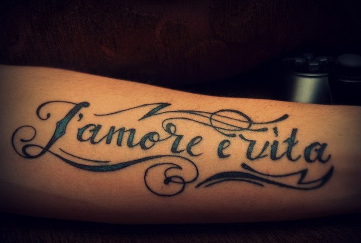 L&quotamore e vita french quote tattoo on arm