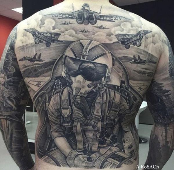 Large whole body war themed tattoo of modern planes and pilot