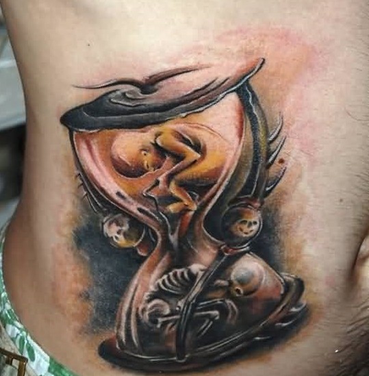 Life and death hourglass tattoo on side