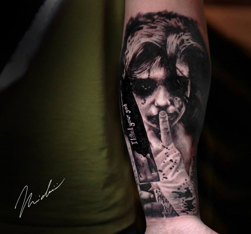 Little horror girl tattoo on forearm