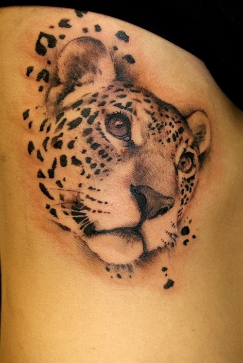 Lovely black-and-white cheetah head tattoo on side