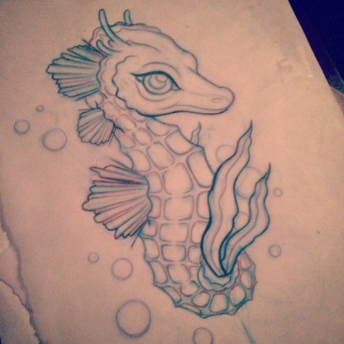 Lovely colorless seahorse baby tattoo design