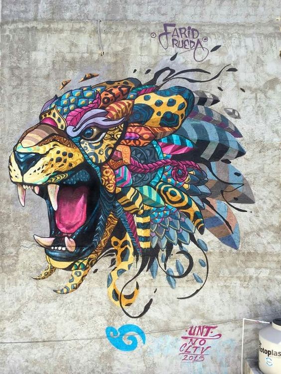 Luxury multicolor feather-decorated roaring jaguar head tattoo design