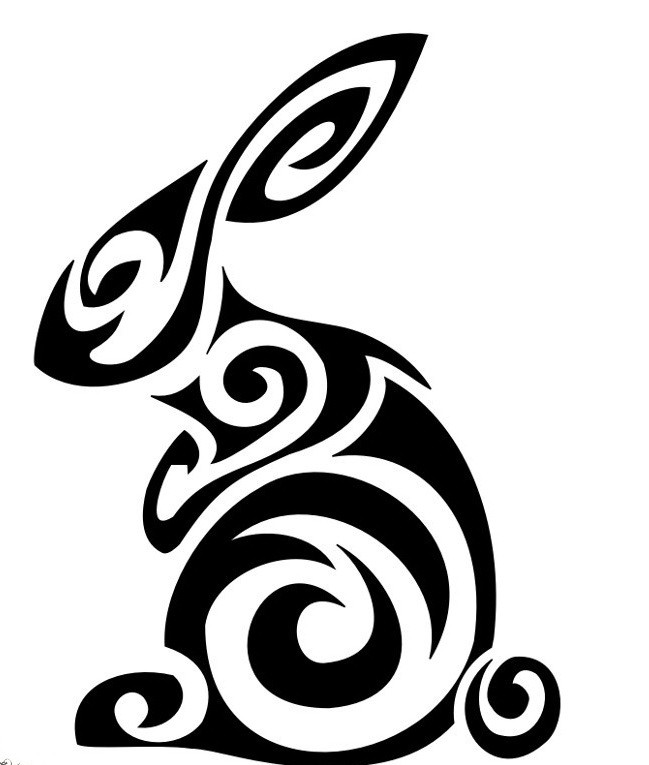 Marvelous black tribal hare with swirly print tattoo design