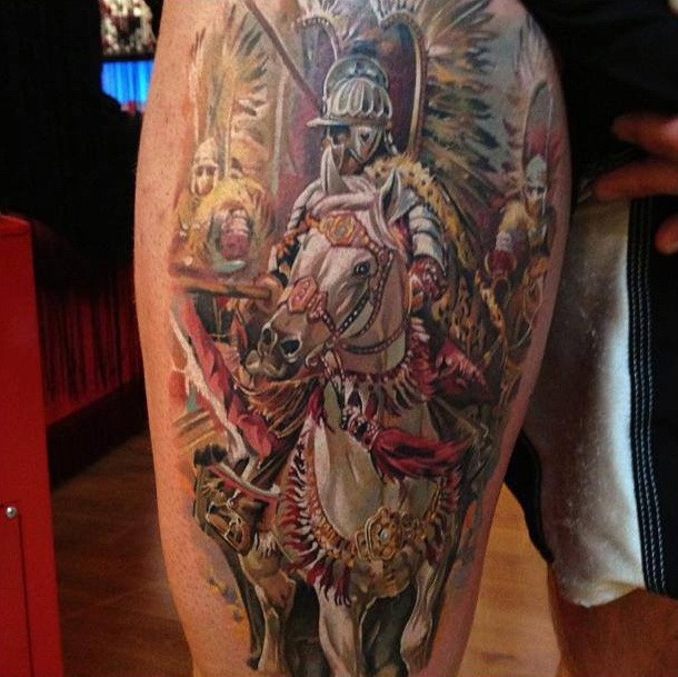 Medieval knight on horseback tattoo on thigh