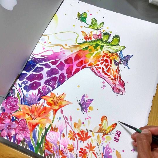 Multicolor giraffe looking forward in flowered ganden tattoo design