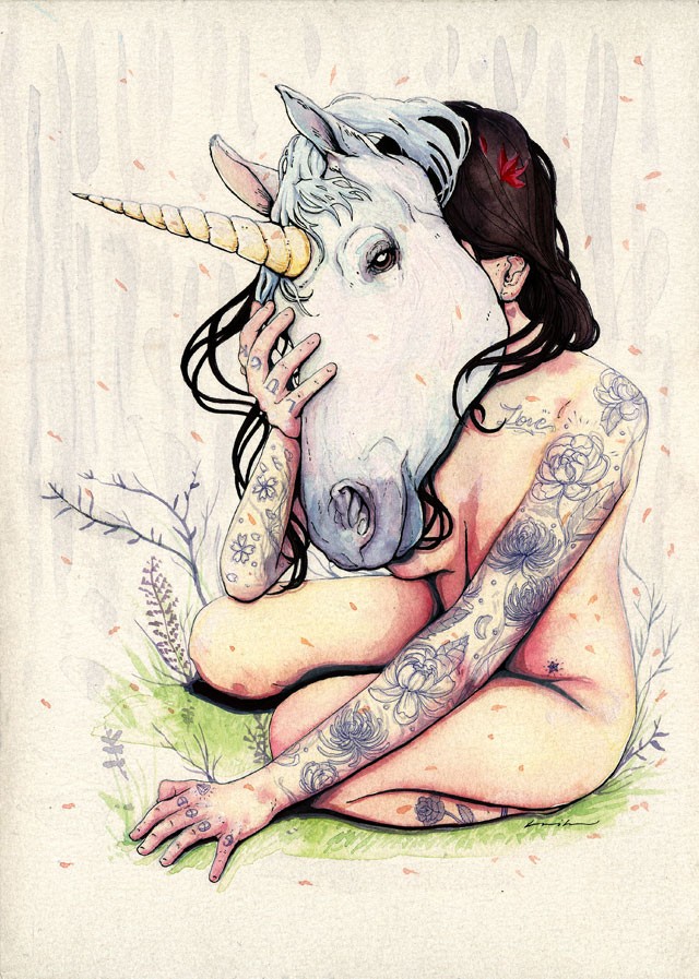 Naked tattooed girl with huge white unicorn mask tattoo design