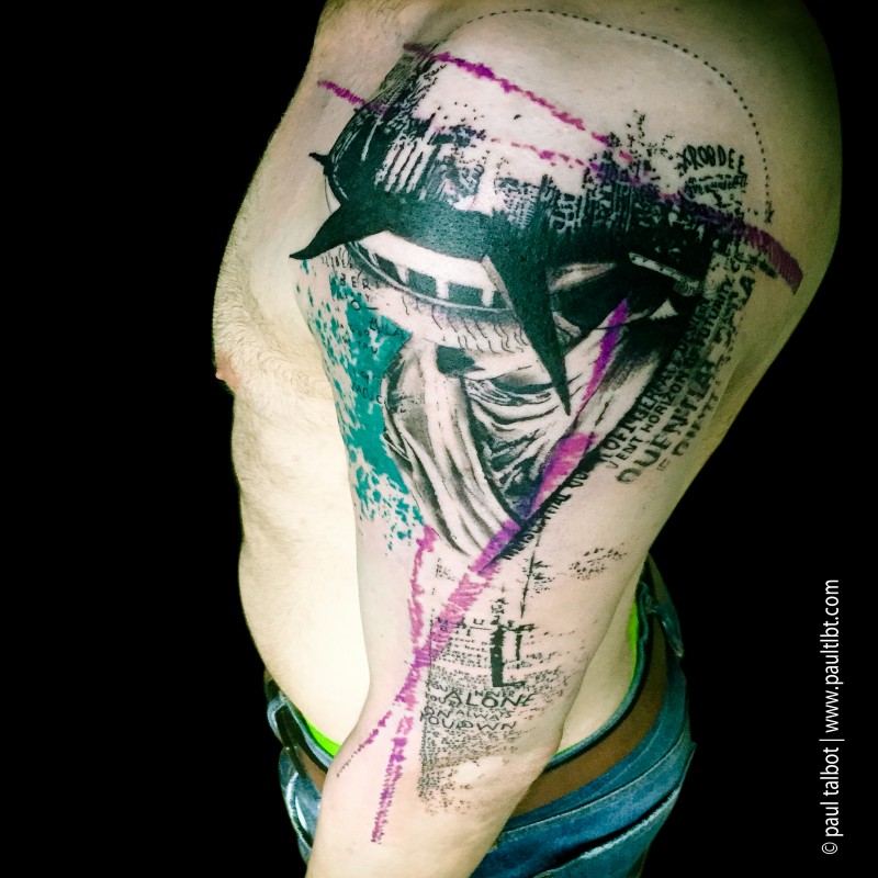 New school style colored upper arm tattoo of Statue of Liberty with lettering