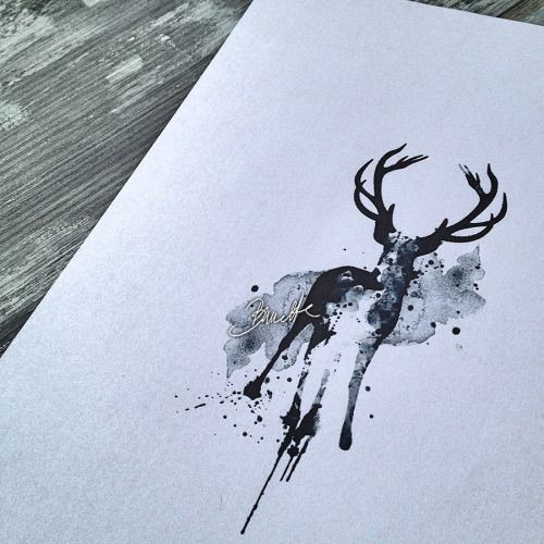 Nice black-ink watercolor deer tattoo design