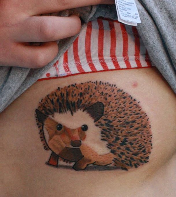 Nice colorful hedgehog tattoo on side