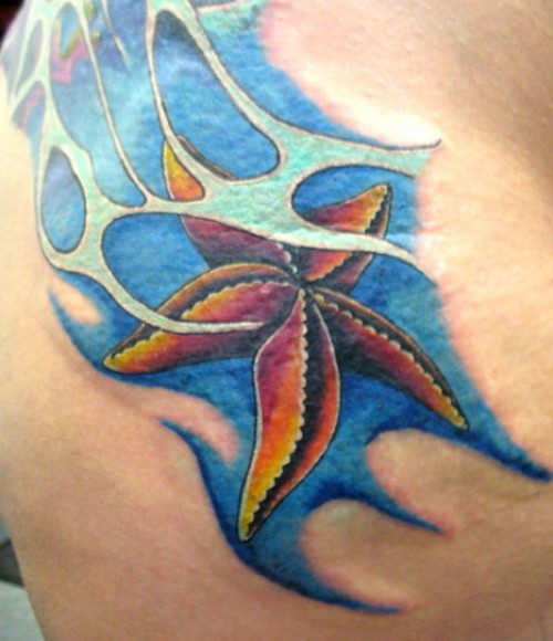 Nice colorful starfish under water tattoo on shoulder