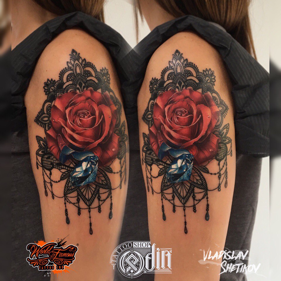Nice girly tattoo with red rose and blue diamond on shoulder