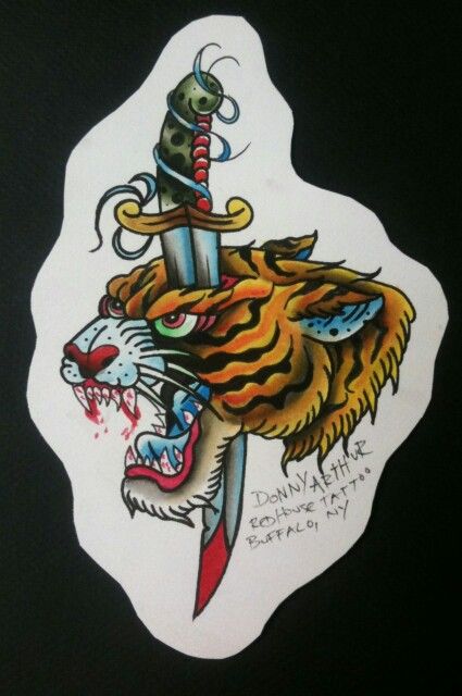 Old school tiger head killed with long dagger tattoo design