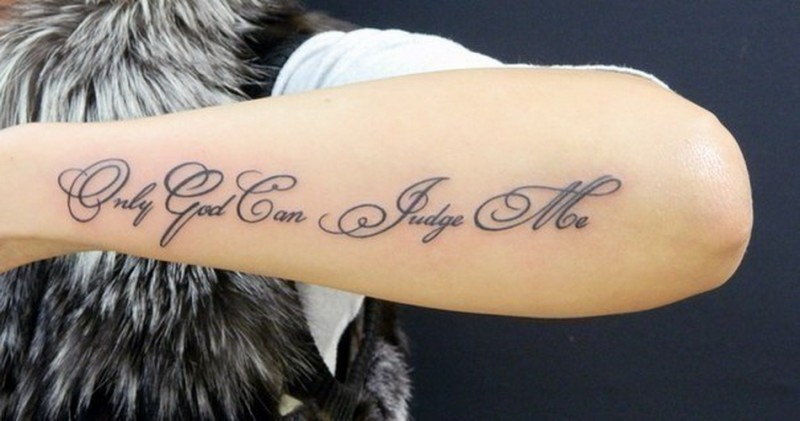 Only God can judge me quote tattoo on arm