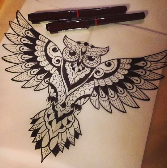 Open-winged ornamented owl tattoo design
